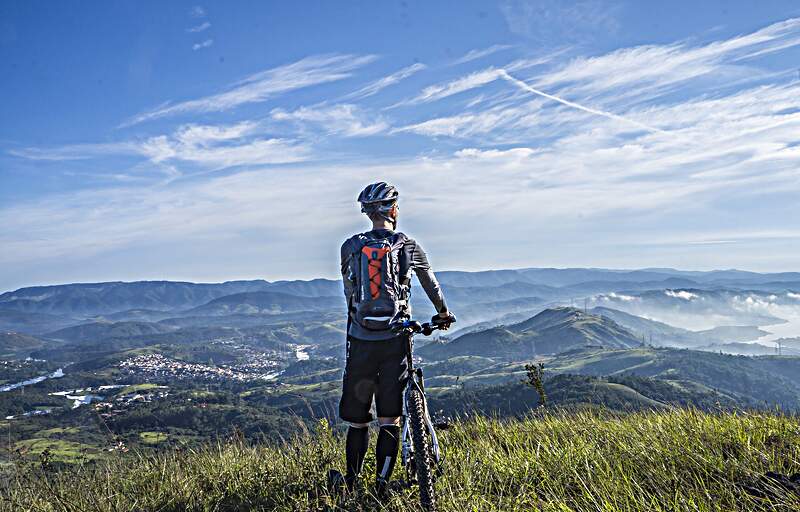 Mountain Biker Mountain biker atop a mountain
